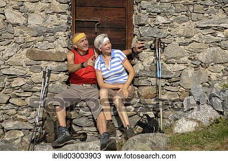 "Married couple, 68 and 70, during a hiking holiday in the mountains, Frasnedo, Italy, Europe" View Large Photo Image Stock Image - "Married couple, 68 and 70, during a hiking holiday in the mountains, Frasnedo, Italy, Europe". Fotosearch