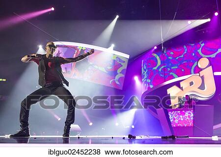 "Martinez Rodriguez, singer from the Italian dance trio Tacabro, performing live at Energy Stars For Free in Hallenstadion, Zurich, Switzerland, Europe" View Large Photo Image Stock Photo - "Martinez Rodriguez, singer from the Italian dance trio Tacabro, performing live at Energy Stars For Free in Hallenstadion, Zurich, Switzerland, Europe". Fotosearch