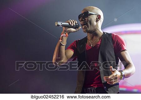 "Martinez Rodriguez, singer from the Italian dance trio Tacabro, performing live at Energy Stars For Free in Hallenstadion, Zurich, Switzerland, Europe" View Large Photo Image Stock Photograph - "Martinez Rodriguez, singer from the Italian dance trio Tacabro, performing live at Energy Stars For Free in Hallenstadion, Zurich, Switzerland, Europe". Fotosearch