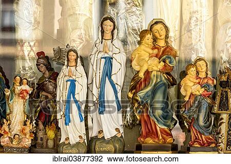 "Mary of Lourdes and other Madonna figures, gift shop, Altotting, Upper Bavaria, Bavaria, Germany, Europe" View Large Photo Image Stock Image - "Mary of Lourdes and other Madonna figures, gift shop, Altotting, Upper Bavaria, Bavaria, Germany, Europe". Fotosearch