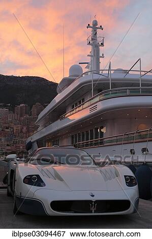 "Maserati in front of the motoryacht """"Siran"""" in Port Hercule at twilight, Furstentum Monaco, Monaco, Monaco, Europe" View Large Photo Image Stock Photo - "Maserati in front of the motoryacht """"Siran"""" in Port Hercule at twilight, Furstentum Monaco, Monaco, Monaco, Europe". Fotosearch
