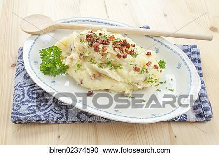 Mashed potatoes with bacon and onions View Large Photo Image Stock Image - Mashed potatoes with bacon and onions. Fotosearch
