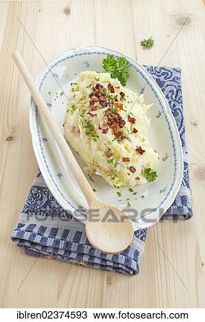 Mashed potatoes with bacon and onions View Large Photo Image Stock Image - Mashed potatoes with bacon and onions. Fotosearch
