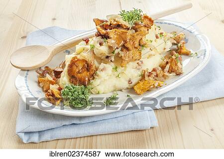 "Mashed potatoes with bacon and onions, roasted chanterelles" View Large Photo Image Stock Photo - "Mashed potatoes with bacon and onions, roasted chanterelles". Fotosearch