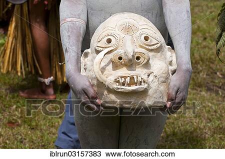 "Mask of the Mudman at the traditional Sing Sing gathering in the highlands, Paya, Papua New Guinea, Oceania" View Large Photo Image Stock Image - "Mask of the Mudman at the traditional Sing Sing gathering in the highlands, Paya, Papua New Guinea, Oceania". Fotosearch