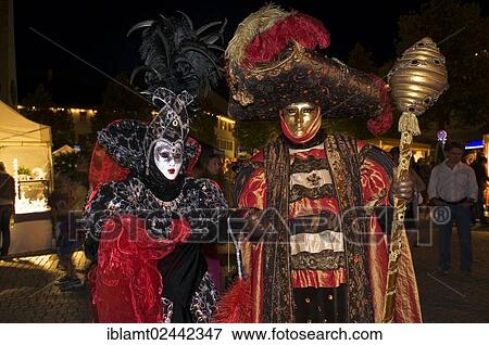 "Mask wearers, Venetian Fair, on the historic Marktplatz market square, Ludwigsburg, Baden-Wuerttemberg, Germany, Europe" View Large Photo Image Stock Photo - "Mask wearers, Venetian Fair, on the historic Marktplatz market square, Ludwigsburg, Baden-Wuerttemberg, Germany, Europe". Fotosearch