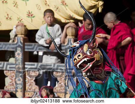 Stock Photo - Masked dancer at Tsechu festival, Trongsa, Bhutan, Asia. Fotosearch