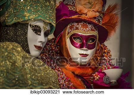 Stock Image - "Masked women at the Carnival in Venice, San Marco, Venice, Italy, Europe". Fotosearch