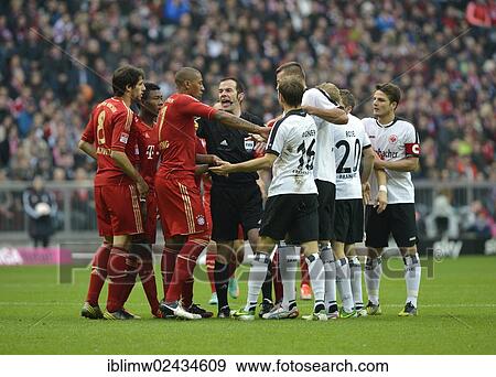 "Mass confrontation of players from FC Bayern and Eintracht Frankfurt discussing a decision with referee Marco Fritz, Allianz Arena, Munich, Bavaria, Germany, Europe" View Large Photo Image Stock Photo - "Mass confrontation of players from FC Bayern and Eintracht Frankfurt discussing a decision with referee Marco Fritz, Allianz Arena, Munich, Bavaria, Germany, Europe". Fotosearch