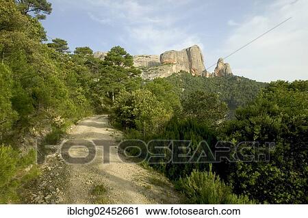 "Massif dels Ports dominated by the rocks of Benet, near Horta de Sant Joan, Catalonia, Spain, Europe" View Large Photo Image Stock Image - "Massif dels Ports dominated by the rocks of Benet, near Horta de Sant Joan, Catalonia, Spain, Europe". Fotosearch