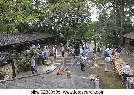 "Matsuri in autumn, Shinto shrine festival, where huge torches are lit, here the torches are being built, the stems on the right and the branches and leaves that are used as tinder on the left, Iwakura near Kyoto, Japan, East Asia, Asia" View Large Photo Image Stock Photography - "Matsuri in autumn, Shinto shrine festival, where huge torches are lit, here the torches are being built, the stems on the right and the branches and leaves that are used as tinder on the left, Iwakura near Kyoto, Japan, East Asia, Asia". Fotosearch