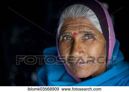 "Mature woman with red bindi on her forehead, Chittorgarh Fort, Chittorgarh, Rajasthan, India, Asia" View Large Photo Image Stock Photo - "Mature woman with red bindi on her forehead, Chittorgarh Fort, Chittorgarh, Rajasthan, India, Asia". Fotosearch