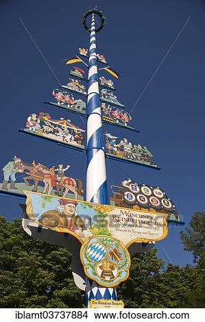 "May pole on Viktualienmarkt square with the explanation of the Munich Beer Purity Law of 1487, historic center, Munich, Upper Bavaria, Bavaria, Germany, Europe" View Large Photo Image Picture - "May pole on Viktualienmarkt square with the explanation of the Munich Beer Purity Law of 1487, historic center, Munich, Upper Bavaria, Bavaria, Germany, Europe". Fotosearch