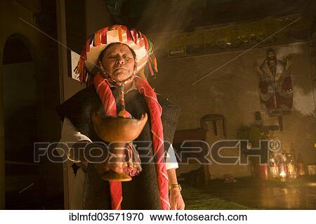"Maya Cuandero, Mayan healer, at a sacrificial ceremony, San Cristobal de las Casas, Chiapas, Mexico, North America" View Large Photo Image Stock Image - "Maya Cuandero, Mayan healer, at a sacrificial ceremony, San Cristobal de las Casas, Chiapas, Mexico, North America". Fotosearch