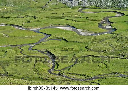 "Meandering stream through the Timmelsalm alpine pasture, Timmelsbach, Stubai Alps, South Tyrol province, Trentino-Alto Adige, Italy, Europe" View Large Photo Image Stock Photography - "Meandering stream through the Timmelsalm alpine pasture, Timmelsbach, Stubai Alps, South Tyrol province, Trentino-Alto Adige, Italy, Europe". Fotosearch