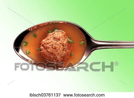 Meatball in broth on a silver spoon View Large Photo Image Stock Photo - Meatball in broth on a silver spoon. Fotosearch
