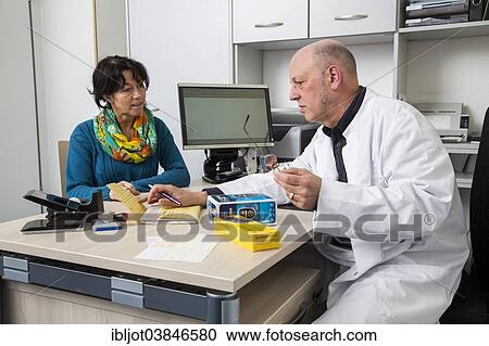 "Medical practice, doctor talking to a diabetes patient about the use of blood glucose meters, Germany, Europe" View Large Photo Image Stock Image - "Medical practice, doctor talking to a diabetes patient about the use of blood glucose meters, Germany, Europe". Fotosearch