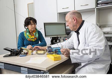 "Medical practice, doctor talking to a diabetes patient about the use of blood glucose meters, Germany, Europe" View Large Photo Image Stock Image - "Medical practice, doctor talking to a diabetes patient about the use of blood glucose meters, Germany, Europe". Fotosearch