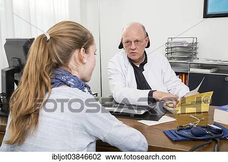 "Medical practice, internal specialist discusses results with a young patient, Germany, Europe" View Large Photo Image Stock Image - "Medical practice, internal specialist discusses results with a young patient, Germany, Europe". Fotosearch