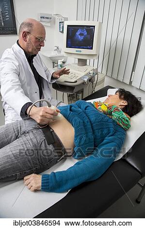 "Medical practice, internist examining a patient with an ultrasound device, ultrasonography, Germany, Europe" View Large Photo Image Picture - "Medical practice, internist examining a patient with an ultrasound device, ultrasonography, Germany, Europe". Fotosearch