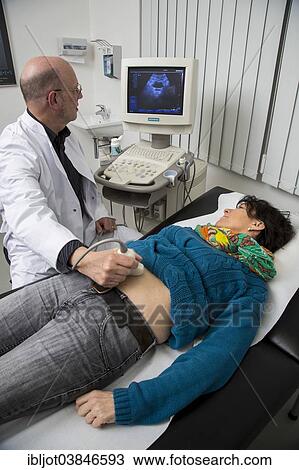 "Medical practice, internist examining a patient with an ultrasound device, ultrasonography, Germany, Europe" View Large Photo Image Stock Image - "Medical practice, internist examining a patient with an ultrasound device, ultrasonography, Germany, Europe". Fotosearch