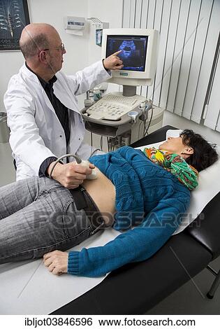 "Medical practice, internist examining a patient with an ultrasound device, ultrasonography, Germany, Europe" View Large Photo Image Stock Photograph - "Medical practice, internist examining a patient with an ultrasound device, ultrasonography, Germany, Europe". Fotosearch
