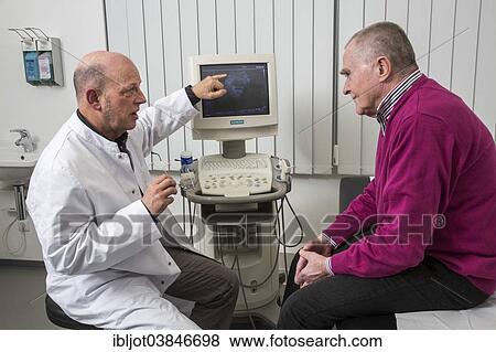 "Medical practice, internist talking to an elderly patient about images from a sonographic scanner, Germany, Europe" View Large Photo Image Stock Photo - "Medical practice, internist talking to an elderly patient about images from a sonographic scanner, Germany, Europe". Fotosearch
