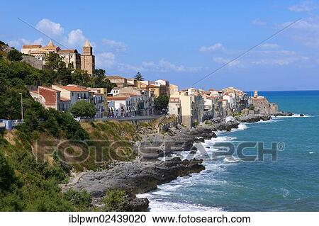 Stock Image - "Medieval houses and seafront of old Cefalu, Sicily, Italy, Europe". Fotosearch