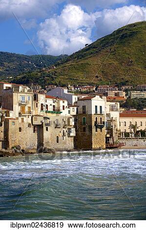 Stock Photo - "Medieval houses and seafront of old Cefalu, Sicily, Italy, Europe". Fotosearch