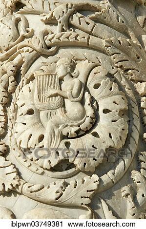 Stock Image - "Medieval sculptural reliefs on the door of the Baptistry of St. John, Pisa, Province of Pisa, Tuscany, Italy, Europe". Fotosearch