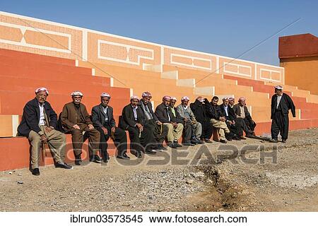 Stock Photography - "Meeting of elderly Kurdish men, Alqosh, Nineveh Province, Iraq, Asia". Fotosearch
