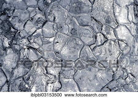 Stock Image - "Melt patterns, close-up of an iceberg, Harriman Fjord, Anchorage, Alaska, United States, North America". Fotosearch