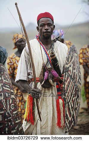 "Member of a folklore group, presentation of traditional music and dance, Rhumsiki, Far North, Cameroon, Africa" View Large Photo Image Stock Photo - "Member of a folklore group, presentation of traditional music and dance, Rhumsiki, Far North, Cameroon, Africa". Fotosearch