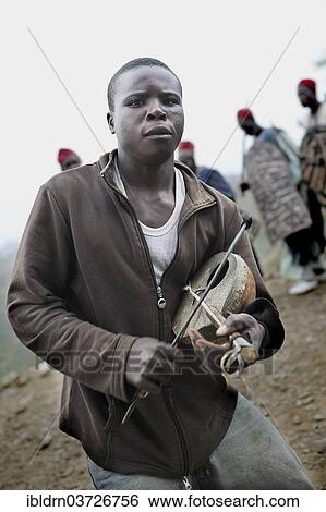 "Member of a folklore group, presentation of traditional music and dance, Rhumsiki, Far North, Cameroon, Africa" View Large Photo Image Stock Photograph - "Member of a folklore group, presentation of traditional music and dance, Rhumsiki, Far North, Cameroon, Africa". Fotosearch