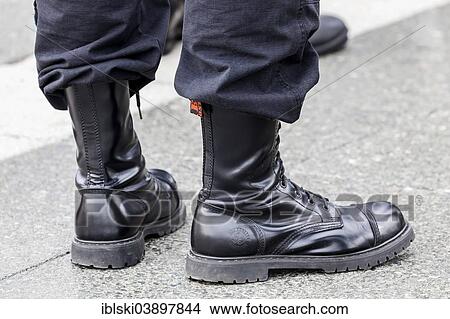 "Member of a right-wing Hungarian party wearing combat boots, symbolic image for right-wing extremism, Budapest, Hungary, Europe" View Large Photo Image Picture - "Member of a right-wing Hungarian party wearing combat boots, symbolic image for right-wing extremism, Budapest, Hungary, Europe". Fotosearch