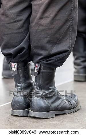 "Member of a right-wing Hungarian party wearing combat boots, symbolic image for right-wing extremism, Budapest, Hungary, Europe" View Large Photo Image Stock Image - "Member of a right-wing Hungarian party wearing combat boots, symbolic image for right-wing extremism, Budapest, Hungary, Europe". Fotosearch