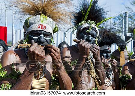 "Members of a tribe in colourfully decorated costumes with face paint at the traditional sing-sing gathering, Hochland, Mount Hagen, Western Highlands Province, Papua New Guinea, Oceania" View Large Photo Image Picture - "Members of a tribe in colourfully decorated costumes with face paint at the traditional sing-sing gathering, Hochland, Mount Hagen, Western Highlands Province, Papua New Guinea, Oceania". Fotosearch