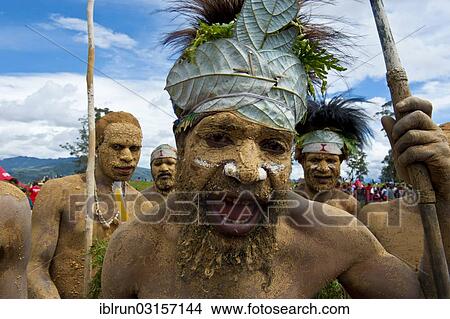 "Members of a tribe in colourfully decorated costumes with face and body paint at the traditional sing-sing gathering, Hochland, Mount Hagen, Western Highlands Province, Papua New Guinea, Oceania" View Large Photo Image Picture - "Members of a tribe in colourfully decorated costumes with face and body paint at the traditional sing-sing gathering, Hochland, Mount Hagen, Western Highlands Province, Papua New Guinea, Oceania". Fotosearch
