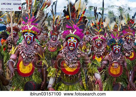 "Members of a tribe in colourfully decorated costumes with face paint at the traditional sing-sing gathering, Hochland, Mount Hagen, Western Highlands Province, Papua New Guinea, Oceania" View Large Photo Image Stock Image - "Members of a tribe in colourfully decorated costumes with face paint at the traditional sing-sing gathering, Hochland, Mount Hagen, Western Highlands Province, Papua New Guinea, Oceania". Fotosearch