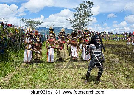 "Members of a tribe in colourfully decorated costumes with face and body paint at the traditional sing-sing gathering, Hochland, Mount Hagen, Western Highlands Province, Papua New Guinea, Oceania" View Large Photo Image Stock Image - "Members of a tribe in colourfully decorated costumes with face and body paint at the traditional sing-sing gathering, Hochland, Mount Hagen, Western Highlands Province, Papua New Guinea, Oceania". Fotosearch