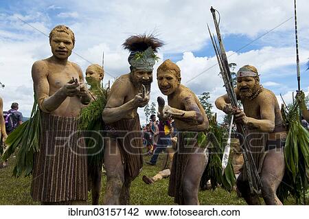 "Members of a tribe in colourfully decorated costumes with face and body paint at the traditional sing-sing gathering, Hochland, Mount Hagen, Western Highlands Province, Papua New Guinea, Oceania" View Large Photo Image Stock Image - "Members of a tribe in colourfully decorated costumes with face and body paint at the traditional sing-sing gathering, Hochland, Mount Hagen, Western Highlands Province, Papua New Guinea, Oceania". Fotosearch