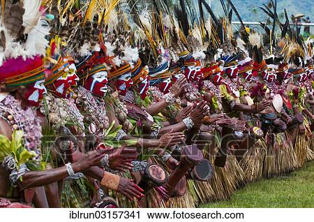 "Members of a tribe in colourfully decorated costumes with face paint at the traditional sing-sing gathering, Hochland, Mount Hagen, Western Highlands Province, Papua New Guinea, Oceania" View Large Photo Image Stock Image - "Members of a tribe in colourfully decorated costumes with face paint at the traditional sing-sing gathering, Hochland, Mount Hagen, Western Highlands Province, Papua New Guinea, Oceania". Fotosearch