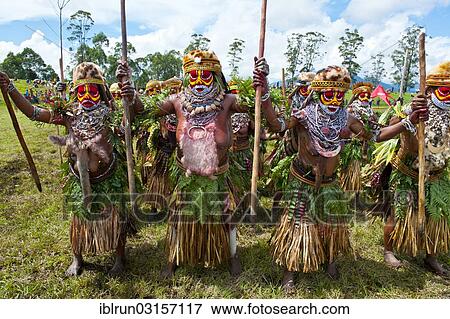 "Members of a tribe in colourfully decorated costumes with face paint at the traditional sing-sing gathering, Hochland, Mount Hagen, Western Highlands Province, Papua New Guinea, Oceania" View Large Photo Image Stock Photo - "Members of a tribe in colourfully decorated costumes with face paint at the traditional sing-sing gathering, Hochland, Mount Hagen, Western Highlands Province, Papua New Guinea, Oceania". Fotosearch