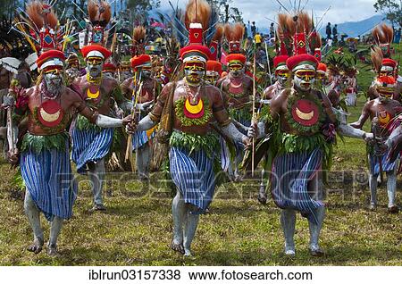 "Members of a tribe in colourfully decorated costumes with face paint at the traditional sing-sing gathering, Hochland, Mount Hagen, Western Highlands Province, Papua New Guinea, Oceania" View Large Photo Image Stock Photo - "Members of a tribe in colourfully decorated costumes with face paint at the traditional sing-sing gathering, Hochland, Mount Hagen, Western Highlands Province, Papua New Guinea, Oceania". Fotosearch