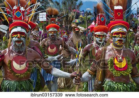 "Members of a tribe in colourfully decorated costumes with face paint at the traditional sing-sing gathering, Hochland, Mount Hagen, Western Highlands Province, Papua New Guinea, Oceania" View Large Photo Image Stock Photo - "Members of a tribe in colourfully decorated costumes with face paint at the traditional sing-sing gathering, Hochland, Mount Hagen, Western Highlands Province, Papua New Guinea, Oceania". Fotosearch