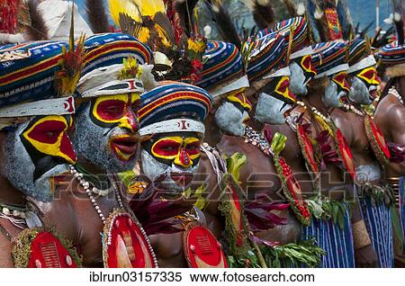 "Members of a tribe in colourfully decorated costumes with face paint at the traditional sing-sing gathering, Hochland, Mount Hagen, Western Highlands Province, Papua New Guinea, Oceania" View Large Photo Image Stock Photography - "Members of a tribe in colourfully decorated costumes with face paint at the traditional sing-sing gathering, Hochland, Mount Hagen, Western Highlands Province, Papua New Guinea, Oceania". Fotosearch