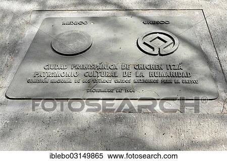 Stock Photography - "Memorial plaque from UNESCO for the declaration of the Mayan ruins of Chichen Itza to a World Heritage site in 1988, Chichen Itza, Yucatan, Mexico, North America". Fotosearch