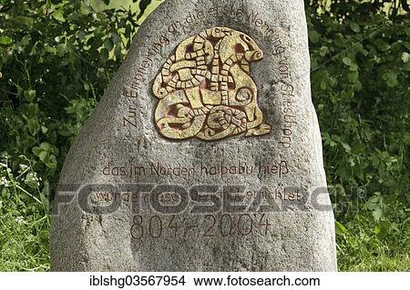 Picture - "Memorial stone at the roadside between the Vikings Museum and the Viking houses at Hedeby, Haithabu, Schleswig-Holstein, Germany, Europe". Fotosearch