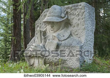 "Memorial to the Fallen of World War I, stone relief of an Alpini soldier in heroic pose, on the wayside to the Ossuary of Pocol or Sacrario Militare di Pocol, built under the reign of Mussolini in 1935, Cortina d'Ampezzo, Pocol, Veneto, Italy, Europe" View Large Photo Image Picture - "Memorial to the Fallen of World War I, stone relief of an Alpini soldier in heroic pose, on the wayside to the Ossuary of Pocol or Sacrario Militare di Pocol, built under the reign of Mussolini in 1935, Cortina d'Ampezzo, Pocol, Veneto, Italy, Europe". Fotosearch