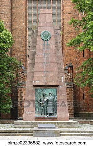 "Memorial to the fallen Soviet soldiers, inaugurated on 7th November 1967, relief of a Soviet officer and a worker, Neuer Markt square, in front of the south entrance of Marienkirche church, Stralsund, Mecklenburg-Western Pomerania, Germany, Europe" View Large Photo Image Stock Image - "Memorial to the fallen Soviet soldiers, inaugurated on 7th November 1967, relief of a Soviet officer and a worker, Neuer Markt square, in front of the south entrance of Marienkirche church, Stralsund, Mecklenburg-Western Pomerania, Germany, Europe". Fotosearch